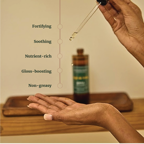 Applying Sage & Veda Koyna Hair Oil with dropper, showing nourishing, fortifying benefits for scalp and hair.